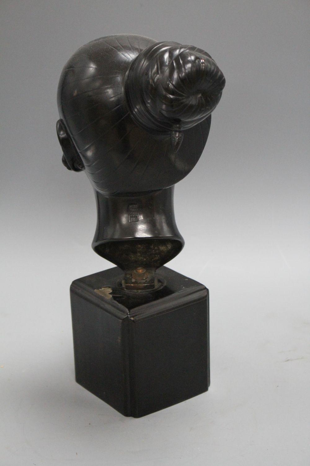 Nguyen Thanh Le (1919- Vietnam). A bronze head of a Vietnamese woman, H.13.5in.